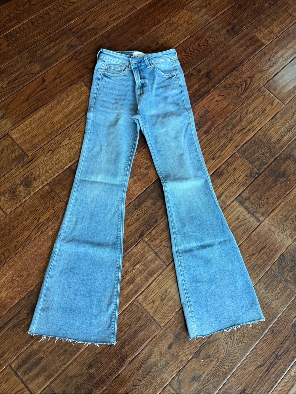 Light Blue High-Rise Flare Jeans with Raw Hem